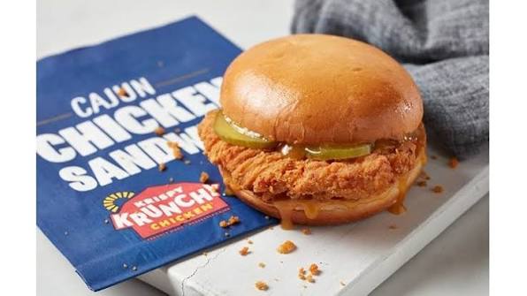 Cajun fried chicken sandwich with pickles on a brioche bun